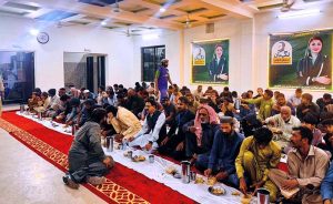 A large number of faithful sit together to break their fast at the Negahban Ramzan Dastarkhwan to provide free Iftar meals to the public from Punjab Government during the holy month of Ramazan at the General Bus Stand.