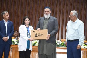 Vice Chancellor of LUMHS University Jamshoro Professor Dr. Ikram Din Ujjan distributing laptop among the deserving student during laptops distribution ceremony of Prime Minister’s National Youth Laptop Scheme at Liaquat Institute Of Medical & Science Thatta.