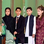 President Asif Ali Zardari presents gifts to orphan children during an Iftar dinner hosted at Aiwan-e-Sadr in connection with the observance of Orphans Day