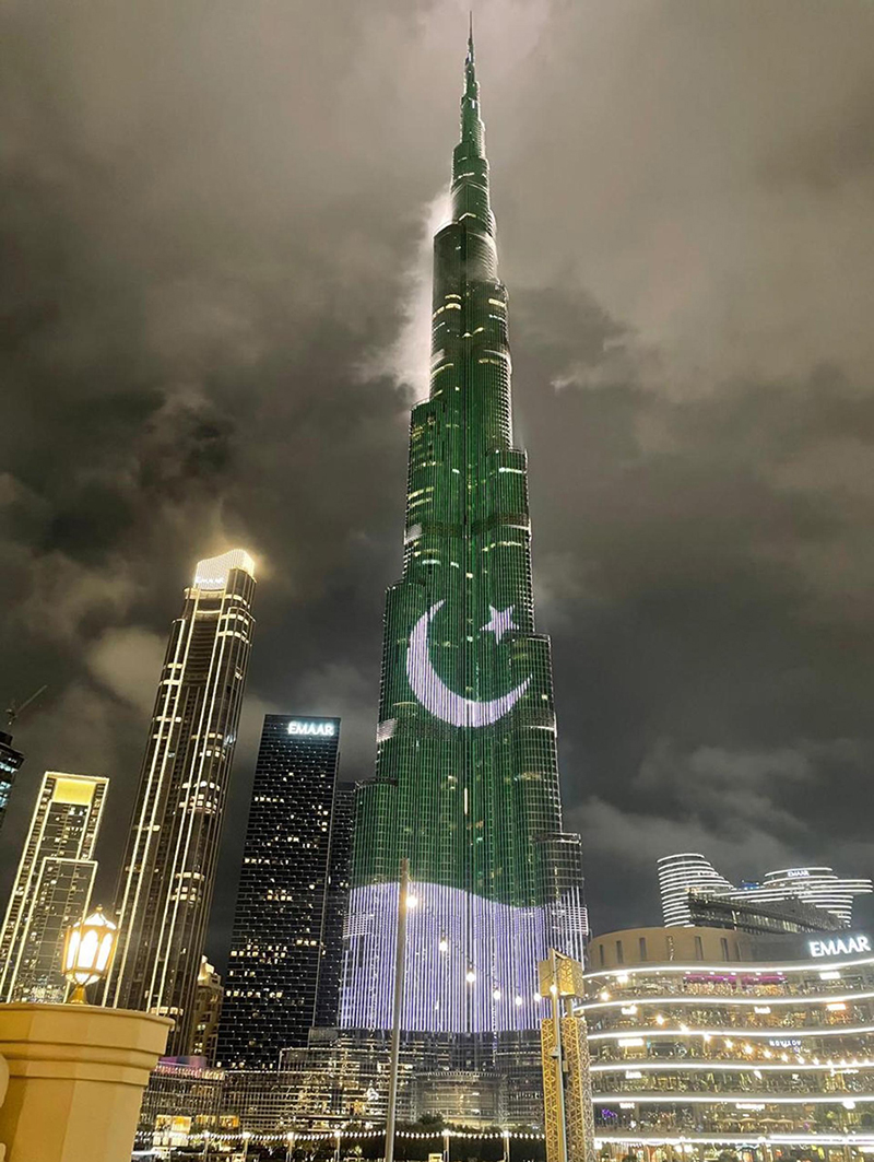 On the occasion of Pakistan Day 2026, Pakistan's national flag is illuminated on the iconic Burj Khalifa tower