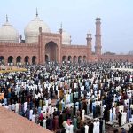 A large number of people are offering Eidul Fitr prayers at Badshahi Masjid