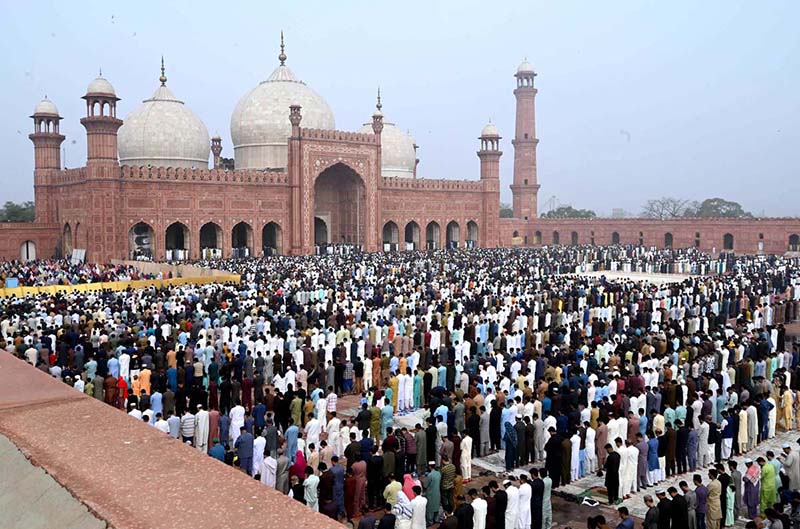 A large number of people are offering Eidul Fitr prayers at Badshahi Masjid