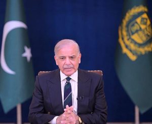 Prime Minister Muhammad Shehbaz Sharif addresses the nation through a television broadcast.