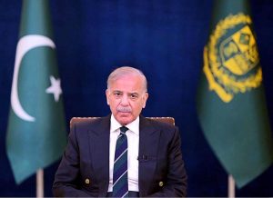 Prime Minister Muhammad Shehbaz Sharif addresses the nation through a television broadcast.