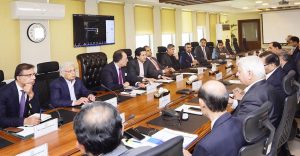 Federal Minister for Finance and Revenue, Senator Muhammad Aurangzeb, chairing a meeting of the Committee to Monitor Petrol Prices in the Wake of the Emerging Situation in the Region, at the Finance Division. APP/ABB