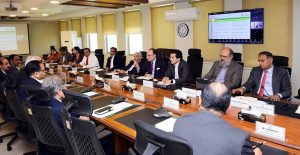 Federal Minister for Finance and Revenue, Senator Muhammad Aurangzeb, chairing a meeting of the Committee to Monitor Petrol Prices in the Wake of the Emerging Situation in the Region, at the Finance Division. APP/ABB