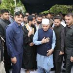 Prime Minister Muhammad Shehbaz Sharif exchanging Eid greetings with people after offering Eid ul Fitr prayers