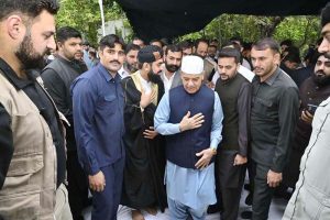 Prime Minister Muhammad Shehbaz Sharif exchanging Eid greetings with people after offering Eid ul Fitr prayers