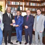Muhammad Saeed Sheikh, President of the Houston-Karachi Sister City Association, presents the gift on behalf of the Mayor of Houston to Sindh Governor, Muhammad Nehal Hashmi at Governor House