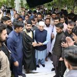 Prime Minister Muhammad Shehbaz Sharif exchanging Eid greetings with people after offering Eid ul Fitr prayers
