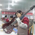 Local guitar industry strikes a chord in E China's Shandong