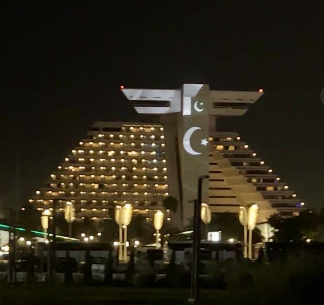 World landmarks illuminate in Pakistan flag colors on Pakistan Day