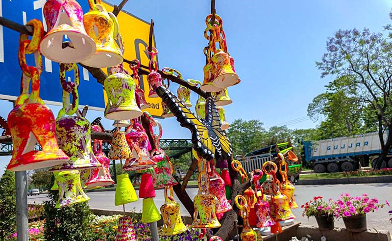 A vendor displayed different colourful decoration stuff to attract the customers at Park Road in the Federal Capital