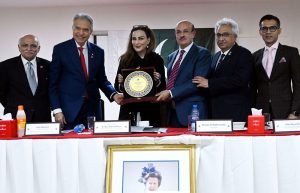 Chairperson Senate Standing Committee on Climate Change Sherry Rehman receives a commemorative shield during a session titled “Navigating War and Peace: Pakistan in a Volatile Century,” organized by the English Speaking Union of Pakistan.