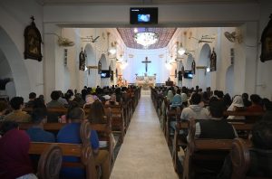 Pakistani Christians gather at Saint Joseph Cathedral Church to attend Easter service to celebrate Easter in the Lalkurti area of the garrison city.