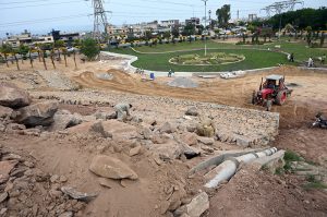Laborers busy in beautification work at Koral Chowk Interchange on the Expressway in the Federal Capital