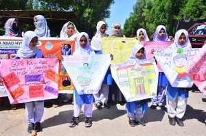 A large number of government primary school teachers, along with students, participate in the Enrollment Drive 2026 awareness walk organized by the District Education Office (Primary) on Thandi Sarak.