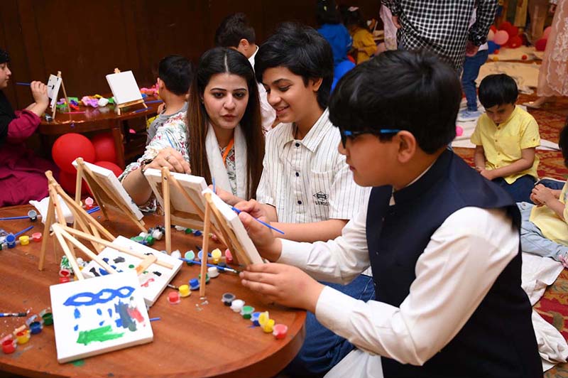 Students are busy in painting during the Exclusive Preview of Sapphire International School