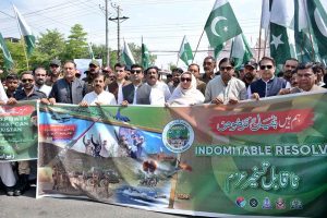 Commissioner Musarat Jabeen and Deputy Commissioner Nadeem Nasir lead a rally to express solidarity with the Pakistan Armed Forces started from District Council Chowk in connection with the one-year celebrations of the Maraka-e-Haq (Bunyan-ul- Marsoos)