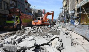 Heavy machinery is being used for maintenance and construction work on Ganj Mandi Road in the city