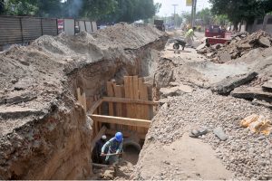 Workers continue sewerage pipeline installation in front of Nishtar Hospital to improve the city’s drainage system.
