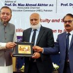Vice Chancellor The Islamia University of Bahawalpur Prof. Dr. Muhammad Kamran presents a shield to Prof. Dr. Niaz Ahmed Akhtar, Chairman of Higher Education Commission of Pakistan