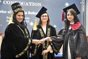 Federal Parliamentary Secretary for Education Rabia Farooqi awarding degree to a successful student during 23rd Convocation of Islamabad Model College for Girls G-10/4.