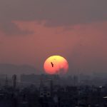 An aerial view of Sunset after rain in the city