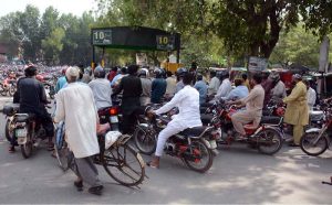 A large number of motorcycles are parked at the entrance of the parking stand at Allied Hospital-II in Faisalabad, raising concern for the hospital administration