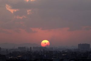 An aerial view of Sunset after rain in the city