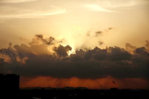 An aerial view of Sunset after rain in the city