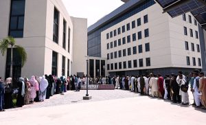 Candidates are standing in queues to submit documents for various job opportunities at the Main Nawaz Sharif Cardiology Center