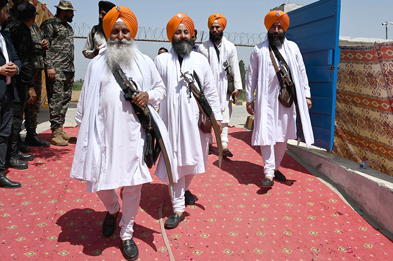 Thousands of Indian Sikh pilgrims (yatrees) arrive at Wagah Border to attend the Vaisakhi Mela and celebrate the 327th birth anniversary of the Khalsa
