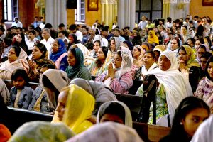 Worshipers attend Good Friday service at the Sacred Heart Cathedral Church