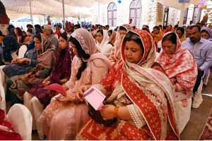 Members of the Christian community offer Easter prayers at Holy Trinity Cathedral.