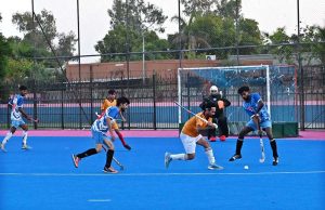 CEO Fieaura Malik Mohammad Hassan, senior hockey player Manzoor Hayder, and organizer Hassan Haider Shah distribute prizes to the winners during the closing ceremony of the Hockey Festival organized by Crescent Hockey Club and Fatima Women Hockey Academy at Austro Turf Hockey Stadium.