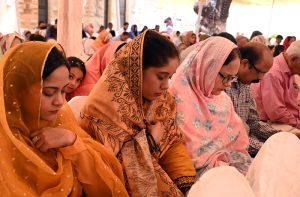 Members of the Christian community offer Easter prayers at Holy Trinity Cathedral.