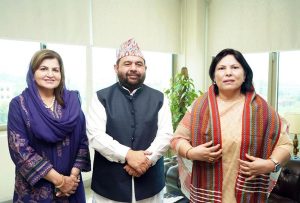 Federal Minister for National Heritage and Culture, Aurangzeb Khan Khichi, presents a traditional cultural shawl to the Ambassador of Nepal, Ms. Rita Dhital, as a gesture of goodwill.