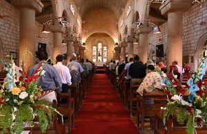 Members of the Christian community offer Easter prayers at Holy Trinity Cathedral.