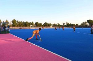 CEO Fieaura Malik Mohammad Hassan, senior hockey player Manzoor Hayder, and organizer Hassan Haider Shah distribute prizes to the winners during the closing ceremony of the Hockey Festival organized by Crescent Hockey Club and Fatima Women Hockey Academy at Austro Turf Hockey Stadium.