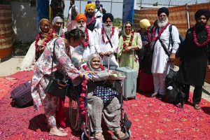 Thousands of Indian Sikh pilgrims (yatrees) arrive at Wagah Border to attend the Vaisakhi Mela and celebrate the 327th birth anniversary of the Khalsa