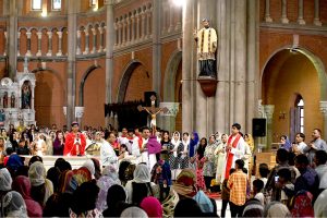 A large number of people from Christian community attend Good Friday service at the Sacred Heart Cathedral Church