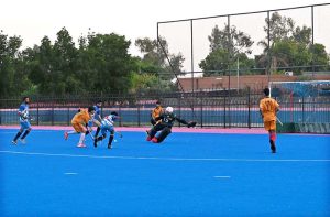 CEO Fieaura Malik Mohammad Hassan, senior hockey player Manzoor Hayder, and organizer Hassan Haider Shah distribute prizes to the winners during the closing ceremony of the Hockey Festival organized by Crescent Hockey Club and Fatima Women Hockey Academy at Austro Turf Hockey Stadium.