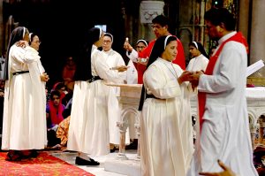 A large number of people from Christian community attend Good Friday service at the Sacred Heart Cathedral Church
