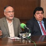 Federal Minister for Planning, Development and Special Initiatives Prof Ahsan Iqbal addressing a press conference at 180H Model Town