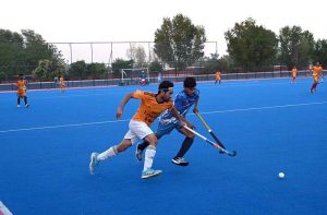 CEO Fieaura Malik Mohammad Hassan, senior hockey player Manzoor Hayder, and organizer Hassan Haider Shah distribute prizes to the winners during the closing ceremony of the Hockey Festival organized by Crescent Hockey Club and Fatima Women Hockey Academy at Austro Turf Hockey Stadium.