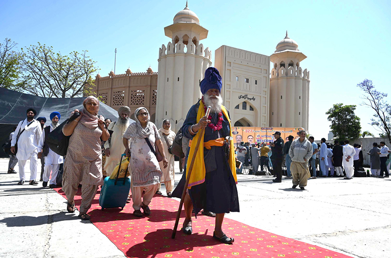 Thousands of Indian Sikh pilgrims (yatrees) arrive at Wagah Border to attend the Vaisakhi Mela and celebrate the 327th birth anniversary of the Khalsa