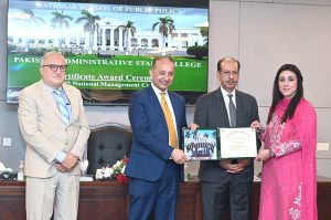Federal Minister for Climate Change Dr. Musaddiq Malik addresses a ceremony for the distribution of certificates among participants of the 124th Management Course at Pakistan Administrative Staff College, Shahrah-e-Quaid-e-Azam