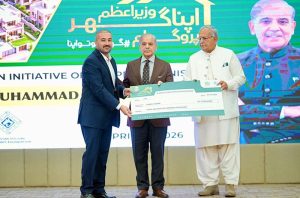 Prime Minister Muhammad Shehbaz Sharif distributes PM Apna Ghar Program cheques among the beneficiaries.