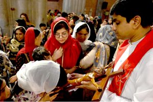 A large number of people from Christian community attend Good Friday service at the Sacred Heart Cathedral Church